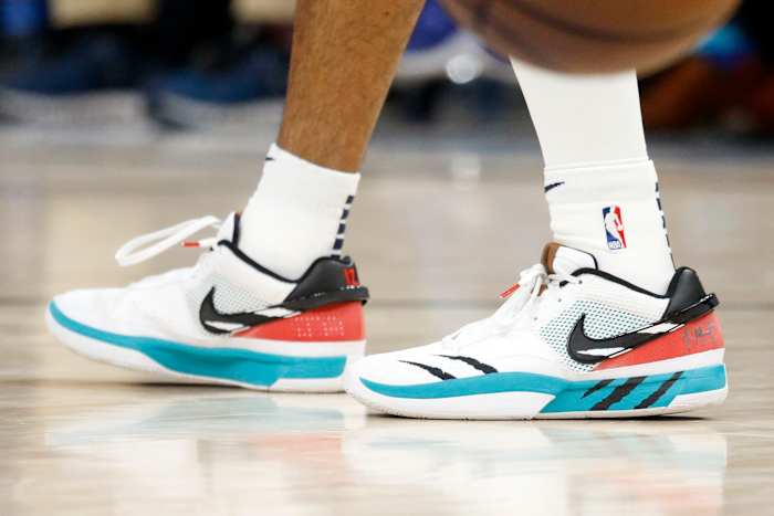 View Ja Morant's white and black Nike shoes.